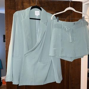 Boutique brand never worn shorts with matching blazer. Color mint.